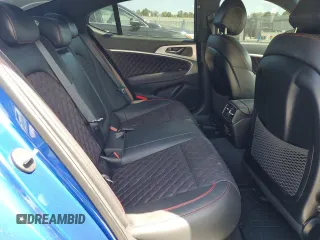 2020 Genesis G70 3.3T with VIN KMTG34LE7LU058061, listed as a Copart auction lot 57534815 with 76,885 mi miles and Salvage title. Bid and sale history available at DreamBid. Image 10.