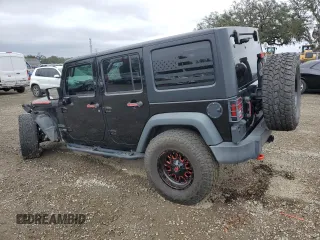 2018 Jeep Wrangler JK Unlimited Sport S with VIN 1C4BJWDG0JL818800, listed as a Copart auction lot 88286715 with 114,011 mi miles and Salvage Title. Bid and sale history available at carsss.com. Image 2.