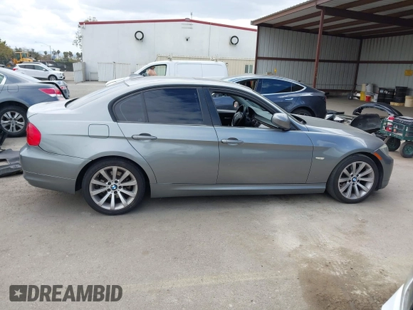2011 BMW 3 Series 328i with VIN WBAPH5G52BNM84035, listed as a IAAI auction lot 42046301 with 165,418 mi miles. Bid and sale history available at carsss.com. Image 13.