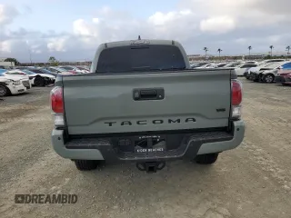 2023 Toyota Tacoma SR z VIN 3TMCZ5AN7PM593826, wystawiony jako Copart lot #50483285 z przebiegiem 14 957 mil mil oraz Szkoda całkowita • Salvage title. Historia ofert i sprzedaży dostępna na DreamBid. Obrazek 6.