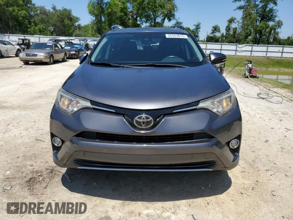 2018 Toyota RAV4 XLE with VIN 2T3WFREV2JW501793, listed as a Copart auction lot 52553015 with 67,918 mi miles and Salvage Title. Bid and sale history available at carsss.com. Image 5.