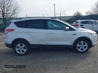 2014 Ford Escape SE with VIN 1FMCU0GX1EUB23743, listed as a IAAI auction lot 40893420 with 74,506 mi miles. Bid and sale history available at carsss.com. Image 12.