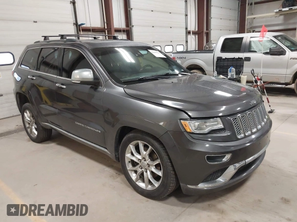 2015 Jeep Grand Cherokee Summit with VIN 1C4RJFJT6FC754799, listed as a IAAI auction lot 41699124 with 124,206 mi miles and . Bid and sale history available at DreamBid. Image 1.