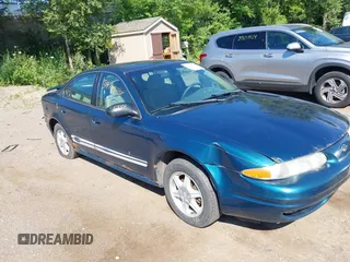 2003 Oldsmobile Alero GL1 with VIN 1G3NL52F53C153441, listed as a IAAI auction lot 39799738 with 180,025 mi miles and . Bid and sale history available at DreamBid. Image 1.