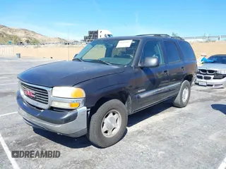 2004 GMC Yukon SLE z VIN 1GKEC13V04R254727, wystawiony jako IAAI lot #41655405 z przebiegiem 224 958 mil mil oraz . Historia ofert i sprzedaży dostępna na DreamBid. Obrazek 2.