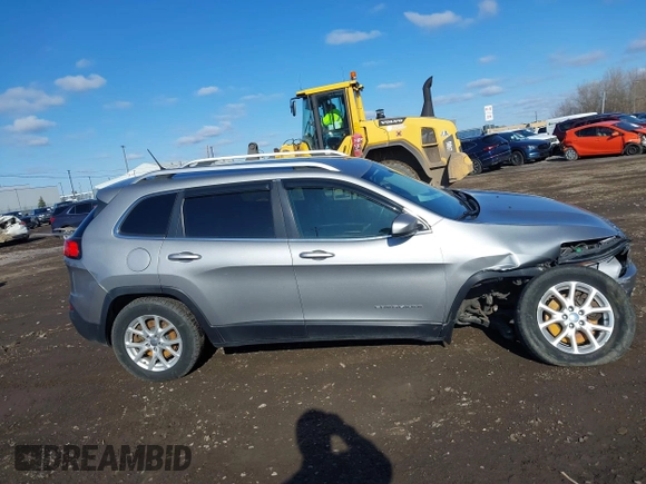 2014 Jeep Cherokee Latitude with VIN 1C4PJMCBXEW107559, listed as a IAAI auction lot 41859246 with 94,812 mi miles and . Bid and sale history available at DreamBid. Image 13.
