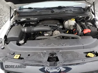 2021 Ram 1500 Big Horn z VIN 1C6SRFBT6MN573722, wystawiony jako Copart lot #56175575 z przebiegiem 141 115 mil mil oraz Szkoda całkowita • Salvage title. Historia ofert i sprzedaży dostępna na DreamBid. Obrazek 11.