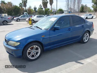 2003 BMW 3 Series 325i with VIN WBAAZ33493PH33881, listed as a IAAI auction lot 41866926 with 183,951 mi miles. Bid and sale history available at carsss.com. Image 2.