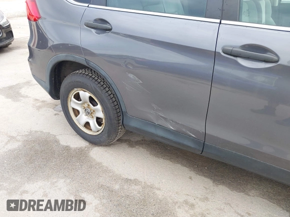 2015 Honda CR-V LX with VIN 5J6RM4H34FL031089, listed as a IAAI auction lot 42123159 with 74,566 mi miles and . Bid and sale history available at DreamBid. Image 6.