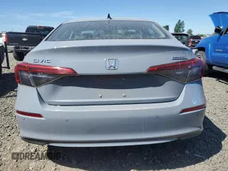 2022 Honda Civic Touring with VIN 2HGFE1F90NH319961, listed as a Copart auction lot 57799335 with 36,458 mi miles and Salvage title. Bid and sale history available at DreamBid. Image 6.