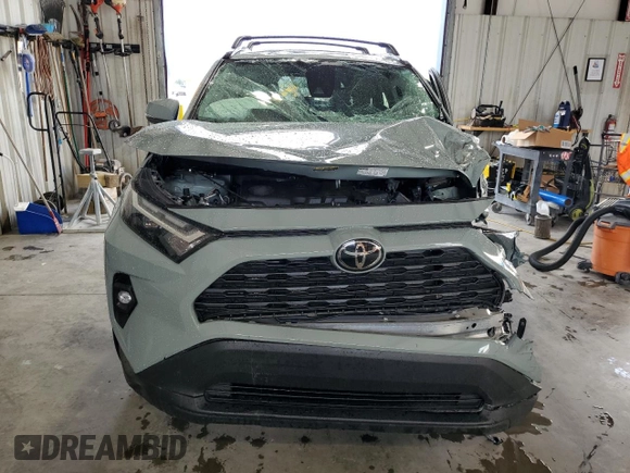 2022 Toyota RAV4 XLE Premium с VIN 2T3A1RFV6NW301836, выставлен на аукционе Copart как лот 58658235 с пробегом 41 495 миль миль и Списание • Salvage title. История ставок и продаж доступна на DreamBid. Изображение 5.