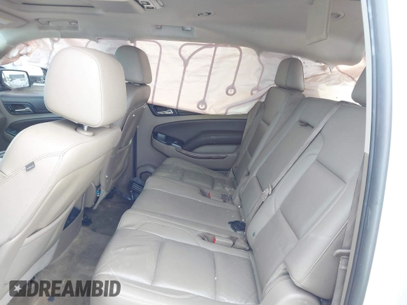 2015 Chevrolet Suburban LT with VIN 1GNSKJKC0FR309866, listed as a IAAI auction lot 41743848 with 220,778 mi miles and . Bid and sale history available at DreamBid. Image 8.