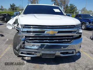 2021 Chevrolet Silverado 1500 LTZ with VIN 1GCUYGEDXMZ202215, listed as a IAAI auction lot 41976044 with 87,758 mi miles and . Bid and sale history available at DreamBid. Image 12.