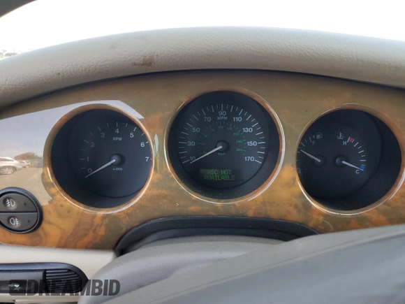 2000 Jaguar XJ with VIN SAJDA14C7YLF18873, listed as a Copart auction lot 50032495 with Not Provided miles and Salvage Title. Bid and sale history available at DreamBid. Image 9.