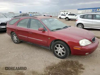 2002 Mercury Sable LS Premium z VIN 1MEFM59S52A640037, wystawiony jako Copart lot #77318134 z przebiegiem 137 836 mil mil oraz Szkody całkowita. Historia ofert i sprzedaży dostępna na DreamBid. Obrazek 4.