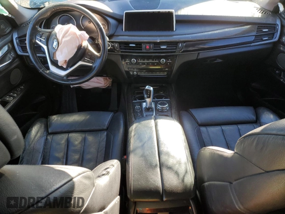 2014 BMW X5 xDrive35i z VIN 5UXKR0C59E0K51868, wystawiony jako Copart lot #79139994 z przebiegiem Nie podano mil oraz Szkoda całkowita • Salvage title. Historia ofert i sprzedaży dostępna na DreamBid. Obrazek 8.