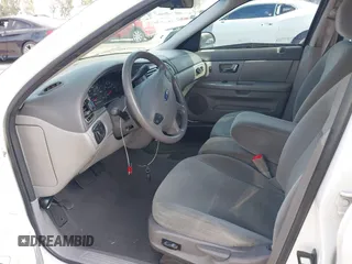 2003 Ford Taurus SES Standard with VIN 1FAFP55293G176494, listed as a IAAI auction lot 42040985 with 95,550 mi miles. Bid and sale history available at carsss.com. Image 5.