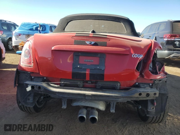 2013 MINI Roadster S z VIN WMWSY3C53DT566214, wystawiony jako Copart lot #83463854 z przebiegiem 69 877 mil mil oraz Szkoda całkowita • Salvage title. Historia ofert i sprzedaży dostępna na DreamBid. Obrazek 6.