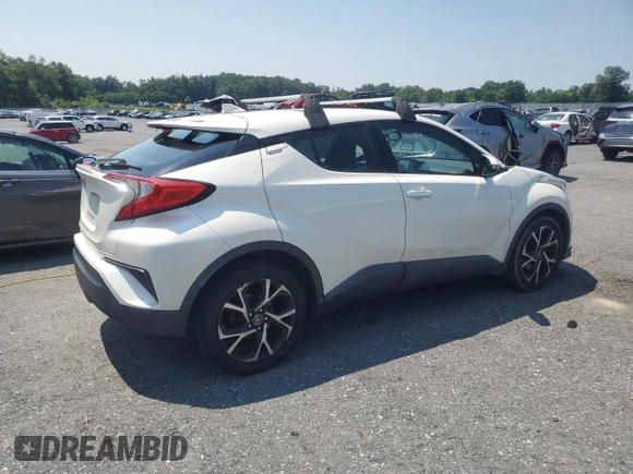 2018 Toyota C-HR XLE with VIN NMTKHMBX6JR027395, listed as a Copart auction lot 63071605 with 124,293 mi miles and Clean title. Bid and sale history available at DreamBid. Image 3.