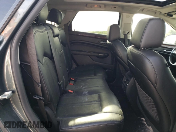 2012 Cadillac SRX Performance Collection z VIN 3GYFNBE3XCS611543, wystawiony jako Copart lot #56628975 z przebiegiem 61 825 mil mil oraz Szkoda całkowita • Salvage title. Historia ofert i sprzedaży dostępna na DreamBid. Obrazek 11.