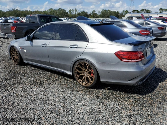 2014 Mercedes-Benz E-Class E 63 AMG S-Model with VIN WDDHF7GB7EA910740, listed as a Copart auction lot 73857184 with 115,493 mi miles and Salvage Title. Bid and sale history available at carsss.com. Image 2.