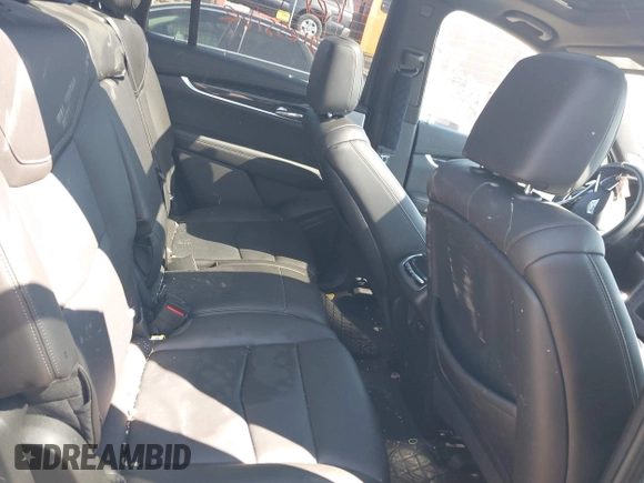 2023 Cadillac XT6 AWD Premium Luxury z VIN 1GYKPDRS4PZ182799, wystawiony jako IAAI lot #42161097 z przebiegiem 22 776 mil mil oraz . Historia ofert i sprzedaży dostępna na DreamBid. Obrazek 8.
