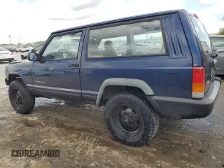 1997 Jeep Cherokee SE with VIN 1J4FT27P0VL612859, listed as a Copart auction lot 49869915 with 198,702 mi miles and Salvage title. Bid and sale history available at DreamBid. Image 2.