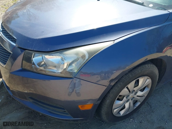 2013 Chevrolet Cruze LS with VIN 1G1PA5SH1D7314922, listed as a IAAI auction lot 42038088 with 121,811 mi miles. Bid and sale history available at carsss.com. Image 12.