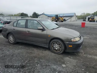2000 Infiniti G20 Luxury z VIN JNKCP11A1YT304887, wystawiony jako Copart lot #74562724 z przebiegiem 202 140 mil mil oraz Czysty tytuł • Clean title. Historia ofert i sprzedaży dostępna na DreamBid. Obrazek 4.