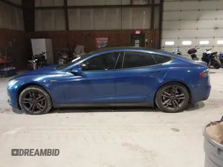 2014 Tesla Model S 60 with VIN 5YJSA1H1XEFP30497, listed as a IAAI auction lot 41294630 with 203,663 mi miles and . Bid and sale history available at DreamBid. Image 14.