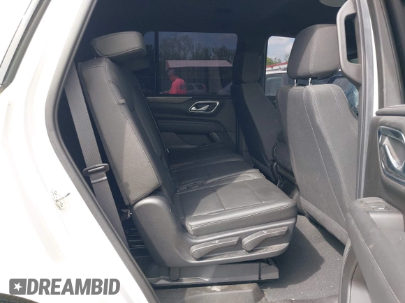 2021 Chevrolet Tahoe Commercial z VIN 1GNSKLEDXMR359932, wystawiony jako IAAI lot #42275551 z przebiegiem 24 mil mil oraz . Historia ofert i sprzedaży dostępna na DreamBid. Obrazek 8.