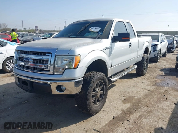 2013 Ford F-150 XL with VIN 1FTFX1CF4DKF71397, listed as a IAAI auction lot 41778335 with 204,179 mi miles. Bid and sale history available at carsss.com. Image 2.