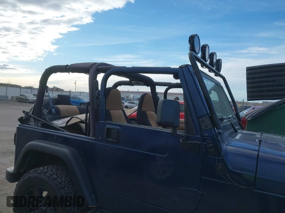 2001 Jeep Wrangler Sport with VIN 1J4FA49S41P334053, listed as a IAAI auction lot 41884967 with 158,258 mi miles. Bid and sale history available at carsss.com. Image 6.