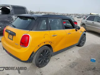 2016 MINI Hardtop 4 Door z VIN WMWXU1C56G2D10006, wystawiony jako IAAI lot #41752731 z przebiegiem 67 844 mil mil oraz . Historia ofert i sprzedaży dostępna na DreamBid. Obrazek 4.