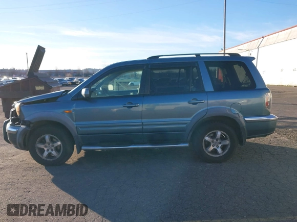 2007 Honda Pilot EX-L with VIN 2HKYF18697H540993, listed as a IAAI auction lot 41243560 with 320,290 mi miles and . Bid and sale history available at DreamBid. Image 14.
