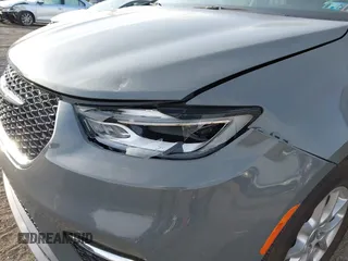 2021 Chrysler Pacifica Touring L with VIN 2C4RC1BG4MR598328, listed as a IAAI auction lot 41749306 with 78,035 mi miles and . Bid and sale history available at DreamBid. Image 6.