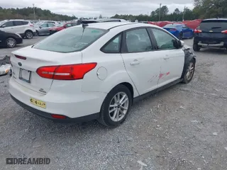 2015 Ford Focus SE with VIN 1FADP3F27FL227528, listed as a IAAI auction lot 41751324 with 94,968 mi miles. Bid and sale history available at carsss.com. Image 4.