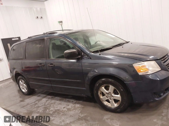 2008 Dodge Grand Caravan SE z VIN 1D8HN44H88B126071, wystawiony jako IAAI lot #41537148 z przebiegiem 231 840 mil mil oraz . Historia ofert i sprzedaży dostępna na DreamBid. Obrazek 14.