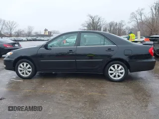 2004 Toyota Camry LE with VIN 4T1BF32K84U074364, listed as a IAAI auction lot 41479264 with 265,865 mi miles. Bid and sale history available at carsss.com. Image 14.