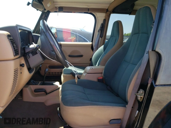 2000 Jeep Wrangler Sahara with VIN 1J4FA59S0YP759138, listed as a Copart auction lot 55329555 with 165,508 mi miles and Clean Title. Bid and sale history available at carsss.com. Image 7.