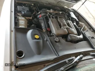 2000 Jaguar XJ with VIN SAJDA25B8YMF04079, listed as a Copart auction lot 50592595 with 131,647 mi miles and Salvage title. Bid and sale history available at DreamBid. Image 11.