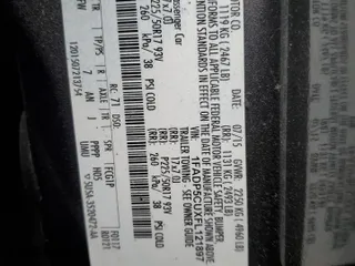2015 Ford C-Max Energi SEL with VIN 1FADP5CUXFL121897, listed as a Copart auction lot 53493675 with 73,448 mi miles and Salvage Title. Bid and sale history available at carsss.com. Image 12.