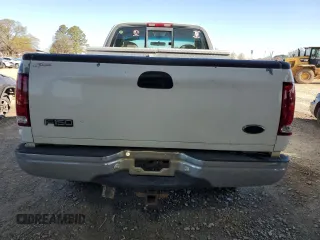 2000 Ford F-150 XL with VIN 1FTRF18W0YNB59622, listed as a Copart auction lot 50178485 with 264,057 mi miles and Salvage title. Bid and sale history available at DreamBid. Image 6.