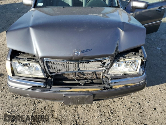 1997 Mercedes-Benz C with VIN WDBHA23E7VF545229, listed as a Copart auction lot 43518335 with 153,158 mi miles and Salvage title. Bid and sale history available at DreamBid. Image 11.