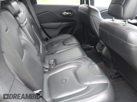 2016 Jeep Cherokee Limited with VIN 1C4PJLDBXGW211996, listed as a IAAI auction lot 42465945 with 153,067 mi miles and . Bid and sale history available at DreamBid. Image 8.