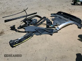 2024 Tesla Model Y z VIN 7SAYGDED2RA329802, wystawiony jako Copart lot #57748805 z przebiegiem 19 391 mil mil oraz Szkoda całkowita • Salvage title. Historia ofert i sprzedaży dostępna na DreamBid. Obrazek 13.