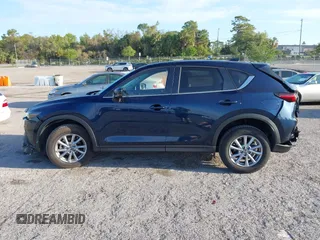 2023 Mazda CX-5 2.5 S Select Package with VIN JM3KFBBM1P0284887, listed as a IAAI auction lot 41910092 with 2,616 mi miles. Bid and sale history available at carsss.com. Image 14.