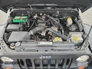 2007 Jeep Wrangler Sahara with VIN 1J8FA54117L172014, listed as a Copart auction lot 63131755 with 115,124 mi miles and Clean title. Bid and sale history available at DreamBid. Image 11.