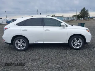 2011 Lexus RX 450h with VIN JTJBC1BA2B2422206, listed as a IAAI auction lot 41798801 with 156,829 mi miles and . Bid and sale history available at DreamBid. Image 13.