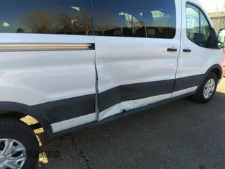 2024 Ford Transit Passenger XL with VIN 1FBAX2YG1RKA02357, listed as a IAAI auction lot 41798726 with 23,315 mi miles and . Bid and sale history available at DreamBid. Image 6.